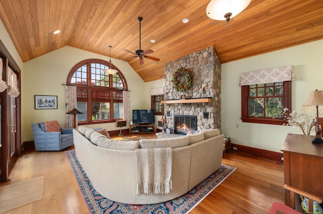 61 High Ridge Ave, Ridgefield, CT 06877 - living room featuring baseboards, wood ceiling, ceiling fan, lofted ceiling, and a stone fireplace