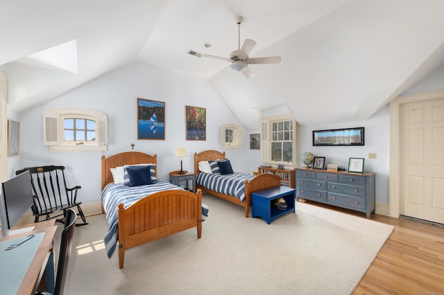 61 High Ridge Ave, Ridgefield, CT 06877 - bedroom featuring multiple windows, light wood-style floors, lofted ceiling, a ceiling fan, and baseboards