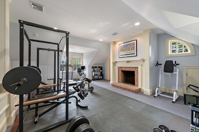 61 High Ridge Ave, Ridgefield, CT 06877 - workout area with a brick fireplace, carpet flooring, recessed lighting, and vaulted ceiling