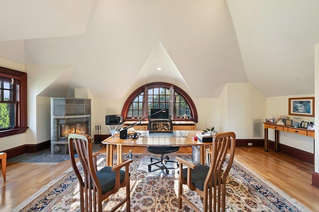61 High Ridge Ave, Ridgefield, CT 06877 - office space featuring light wood finished floors, lofted ceiling, and a tile fireplace