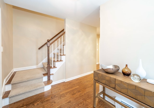 498 Nod Hill Rd, Wilton, CT 06897 - stairs featuring wood finished floors and baseboards