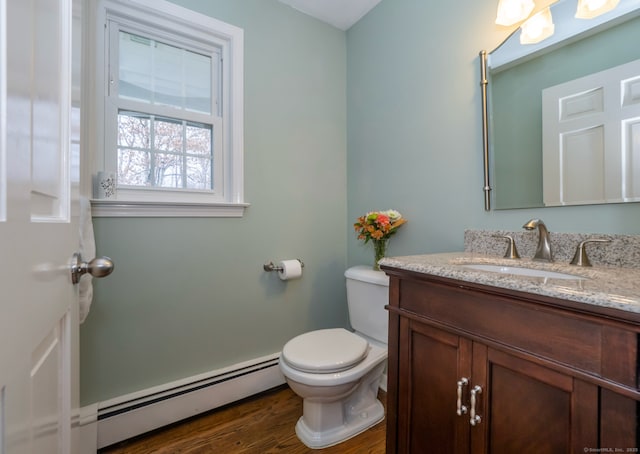 498 Nod Hill Rd, Wilton, CT 06897 - bathroom featuring a baseboard radiator, vanity, toilet, and wood finished floors