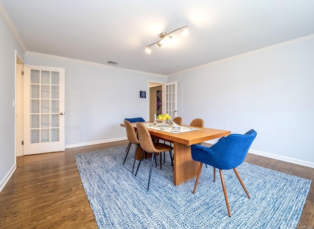 498 Nod Hill Rd, Wilton, CT 06897 - dining area featuring french doors, dark wood-style floors, baseboards, and crown molding