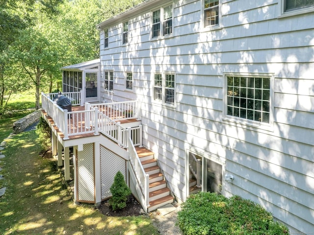 498 Nod Hill Rd, Wilton, CT 06897 - wooden terrace featuring a sunroom and stairs