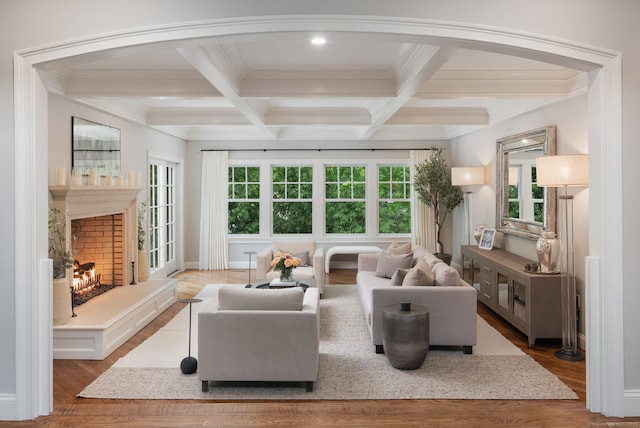 63 Fitch Ln, New Canaan, CT 06840 - living area featuring beam ceiling, wood finished floors, coffered ceiling, ornamental molding, and baseboards