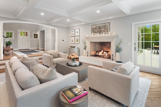 63 Fitch Ln, New Canaan, CT 06840 - living room with arched walkways, wood finished floors, beamed ceiling, coffered ceiling, and recessed lighting