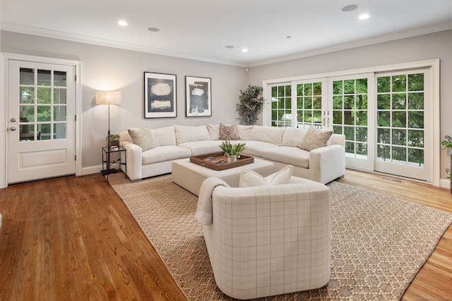 63 Fitch Ln, New Canaan, CT 06840 - living room featuring wood finished floors, ornamental molding, recessed lighting, and baseboards