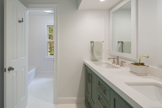 63 Fitch Ln, New Canaan, CT 06840 - bathroom with double vanity, baseboards, tile patterned flooring, and  shower combination