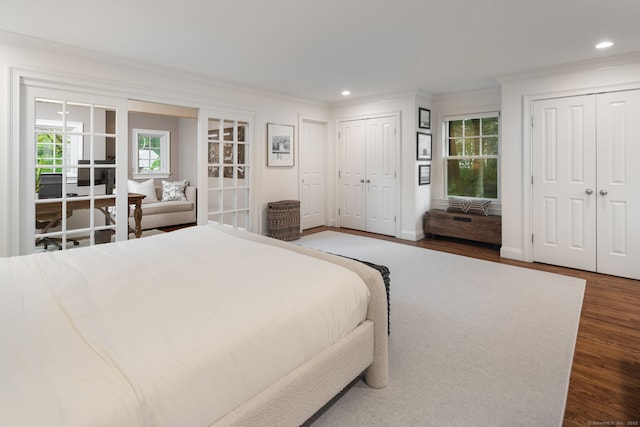 63 Fitch Ln, New Canaan, CT 06840 - bedroom with two closets, ornamental molding, wood finished floors, and recessed lighting