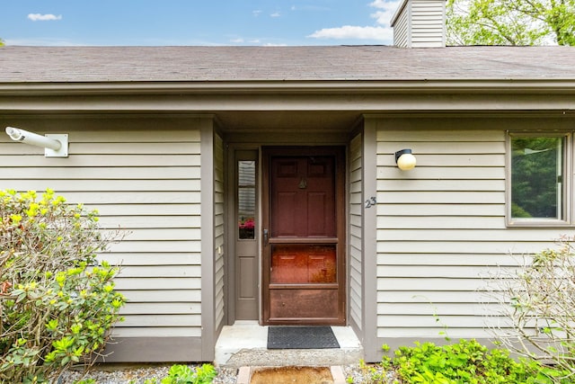 23A Yankee Glen Dr Unit 23A, Madison, CT 06443 - doorway to property with a chimney and a shingled roof