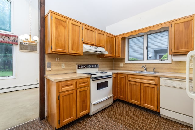 23A Yankee Glen Dr Unit 23A, Madison, CT 06443 - kitchen featuring white appliances, under cabinet range hood, light countertops, and a sink