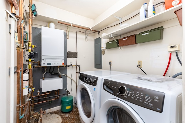23A Yankee Glen Dr Unit 23A, Madison, CT 06443 - washroom with washing machine and clothes dryer, electric panel, and water heater