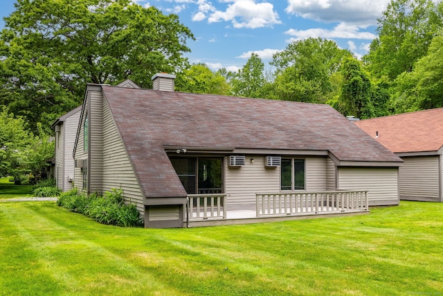 23A Yankee Glen Dr Unit 23A, Madison, CT 06443 - back of property featuring a lawn, a chimney, a wall unit AC, and a deck