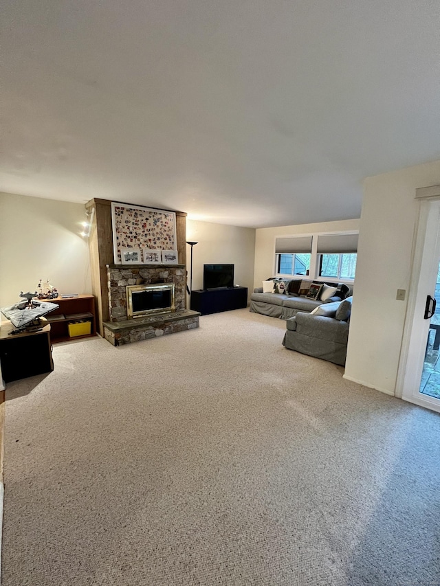 225 Ledge Dr, Torrington, CT 06790 - carpeted living room with a fireplace