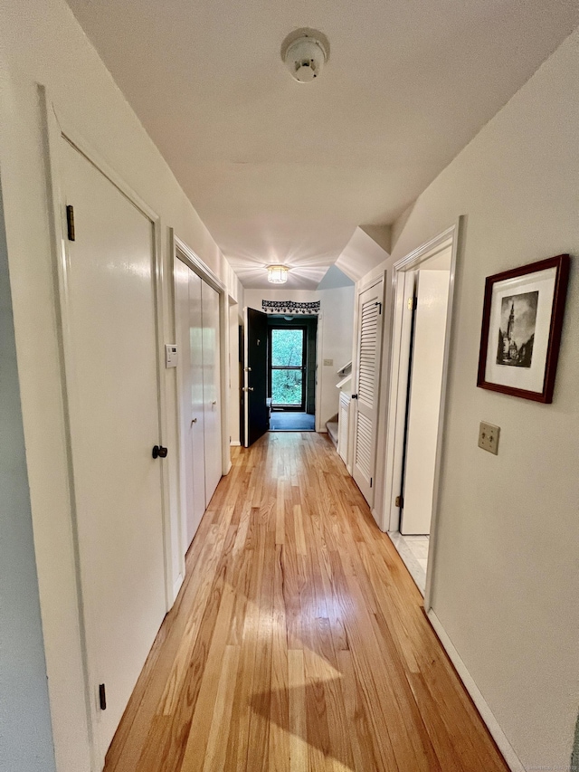 225 Ledge Dr, Torrington, CT 06790 - hall with light wood-style flooring and baseboards