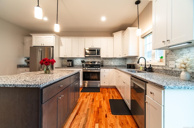 2 Redwood Ln, Southington, CT 06489 - kitchen featuring stainless steel appliances, a sink, and white cabinets