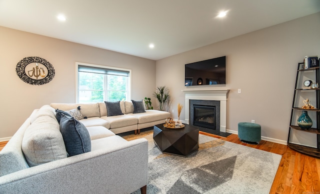 2 Redwood Ln, Southington, CT 06489 - living room featuring wood finished floors, a fireplace with flush hearth, baseboards, and recessed lighting