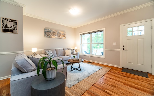 2 Redwood Ln, Southington, CT 06489 - living area featuring plenty of natural light, wood finished floors, crown molding, and baseboards