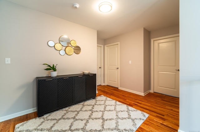 2 Redwood Ln, Southington, CT 06489 - hallway featuring wood finished floors and baseboards
