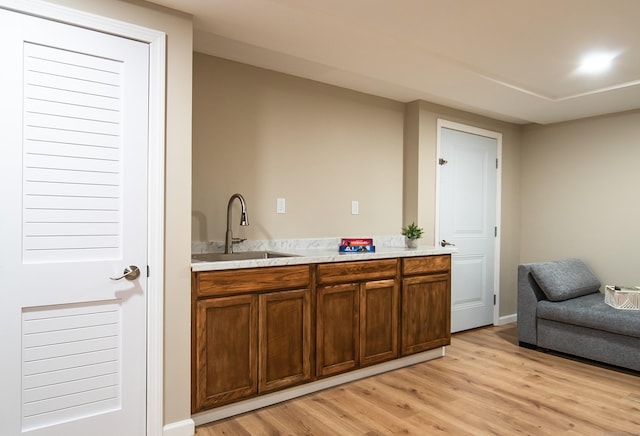 2 Redwood Ln, Southington, CT 06489 - bar area featuring a sink and light wood finished floors
