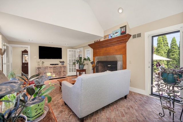 35 Deer Hill Ave, Danbury, CT 06810 - living area with a fireplace, baseboards, brick flooring, recessed lighting, and vaulted ceiling