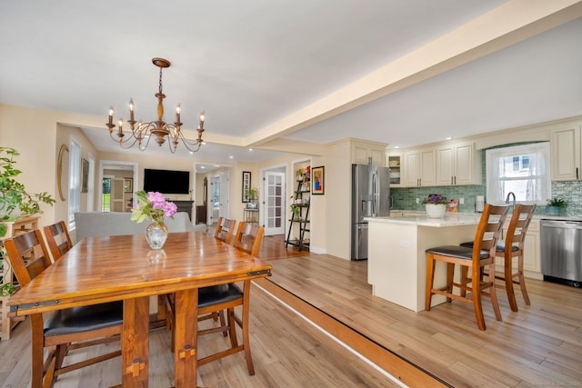 35 Deer Hill Ave, Danbury, CT 06810 - dining room with a chandelier, light wood-style flooring, recessed lighting, and beamed ceiling