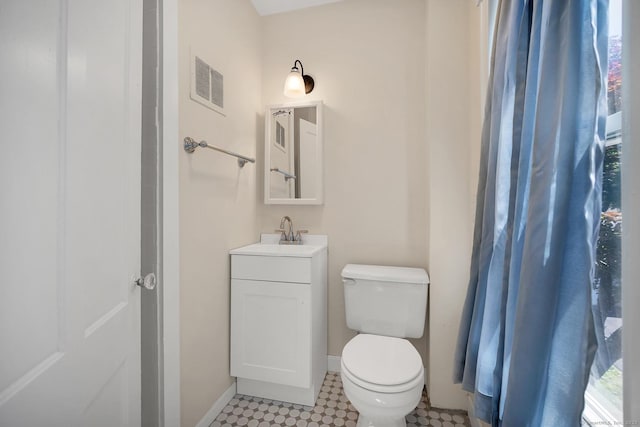 35 Deer Hill Ave, Danbury, CT 06810 - bathroom with toilet, vanity, and baseboards