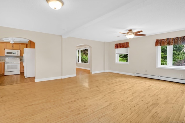 172 S Rd, Marlborough, CT 06447 - unfurnished living room with a baseboard heating unit, a ceiling fan, light wood finished floors, arched walkways, and plenty of natural light