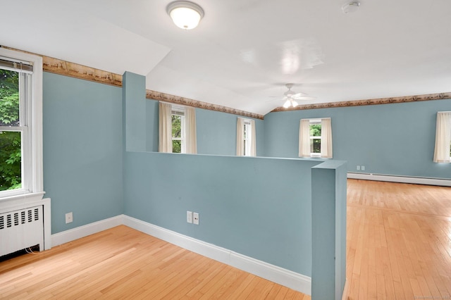 172 S Rd, Marlborough, CT 06447 - unfurnished room with a baseboard radiator, radiator heating unit, hardwood / wood-style floors, ceiling fan, and baseboards