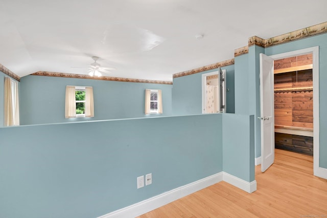 172 S Rd, Marlborough, CT 06447 - spare room with ceiling fan, wood finished floors, baseboards, lofted ceiling, and a smoke detector