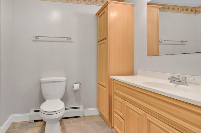 172 S Rd, Marlborough, CT 06447 - bathroom featuring baseboard heating, toilet, vanity, and baseboards
