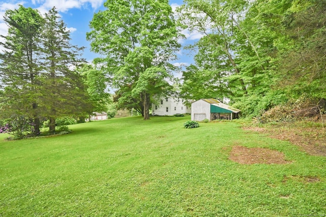 172 S Rd, Marlborough, CT 06447 - view of green lawn with an outdoor structure and a pole building