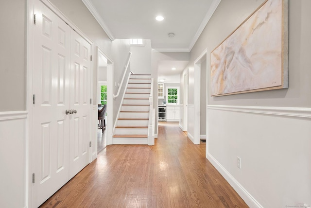 48 Evergreen Rd, Cromwell, CT 06416 - entryway with wood finished floors, stairway, ornamental molding, baseboards, and recessed lighting