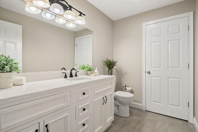 48 Evergreen Rd, Cromwell, CT 06416 - bathroom featuring toilet, vanity, and baseboards