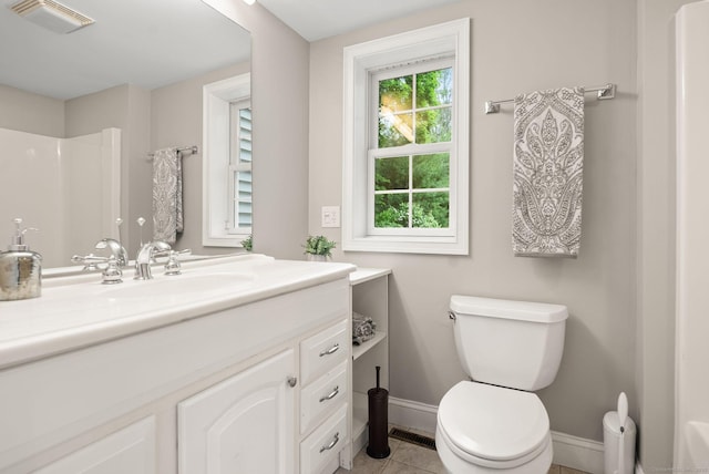 48 Evergreen Rd, Cromwell, CT 06416 - full bathroom featuring baseboards, toilet, vanity, tile patterned flooring, and a shower