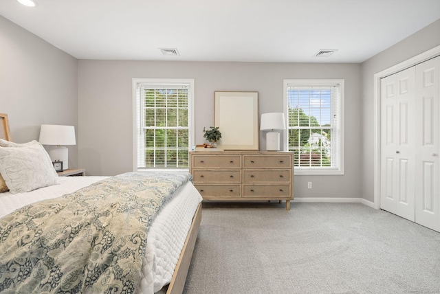 48 Evergreen Rd, Cromwell, CT 06416 - bedroom with light carpet, multiple windows, baseboards, and a closet
