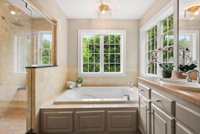 48 Evergreen Rd, Cromwell, CT 06416 - bathroom featuring vanity, a stall shower, and a garden tub