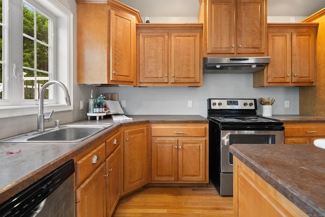 48 Evergreen Rd, Cromwell, CT 06416 - kitchen with under cabinet range hood, stainless steel appliances, a sink, and plenty of natural light