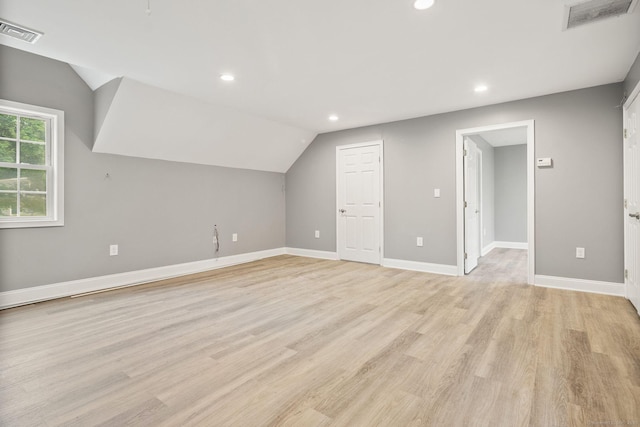 48 Evergreen Rd, Cromwell, CT 06416 - additional living space with recessed lighting, lofted ceiling, light wood-style floors, and baseboards