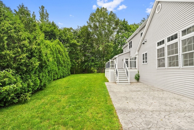 48 Evergreen Rd, Cromwell, CT 06416 - view of grassy yard with a patio and a deck