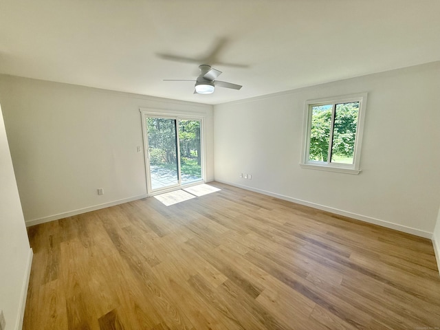 740 Heritage Vlg Unit B, Southbury, CT 06488 - empty room with ceiling fan, light wood-style floors, and baseboards