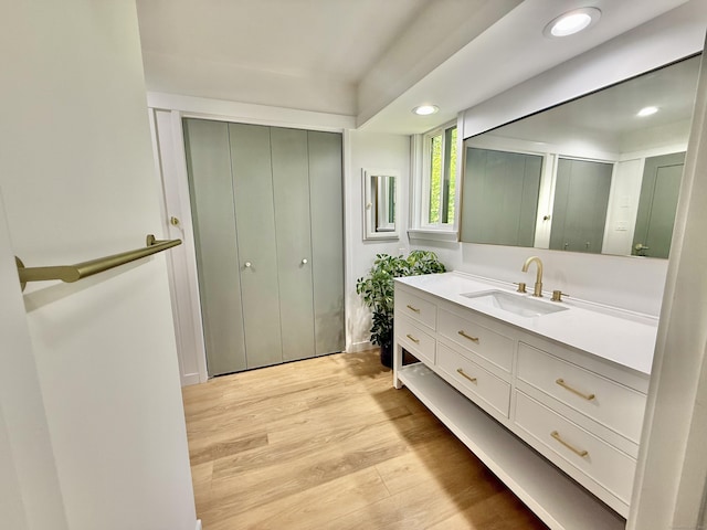 740 Heritage Vlg Unit B, Southbury, CT 06488 - bathroom featuring vanity, wood finished floors, and recessed lighting