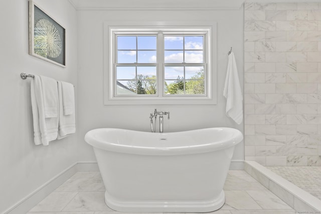 15 Barton Rd, Fairfield, CT 06824 - bathroom with baseboards, marble finish floors, a freestanding bath, and a tile shower