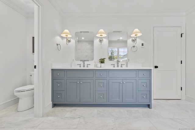 15 Barton Rd, Fairfield, CT 06824 - full bath featuring double vanity, ornamental molding, toilet, marble finish flooring, and baseboards