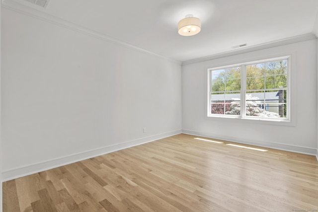 15 Barton Rd, Fairfield, CT 06824 - unfurnished room featuring ornamental molding, light wood-style flooring, and baseboards