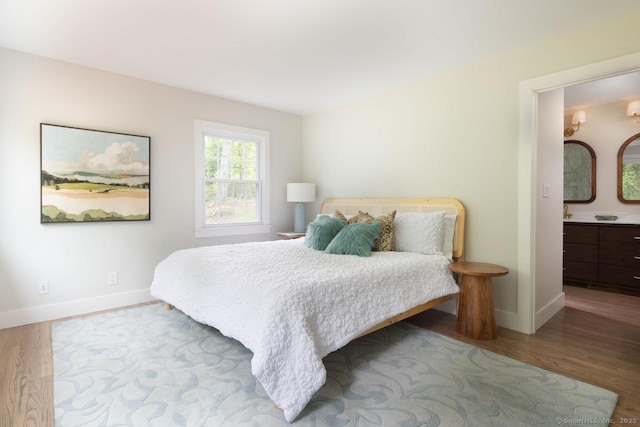 331 Calkinstown Rd, Sharon, CT 06069 - bedroom featuring wood finished floors, baseboards, and ensuite bathroom