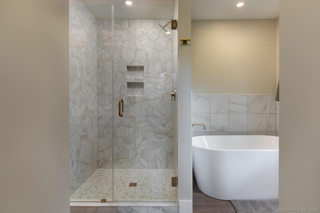 331 Calkinstown Rd, Sharon, CT 06069 - full bath featuring a freestanding tub, recessed lighting, a stall shower, and tile walls