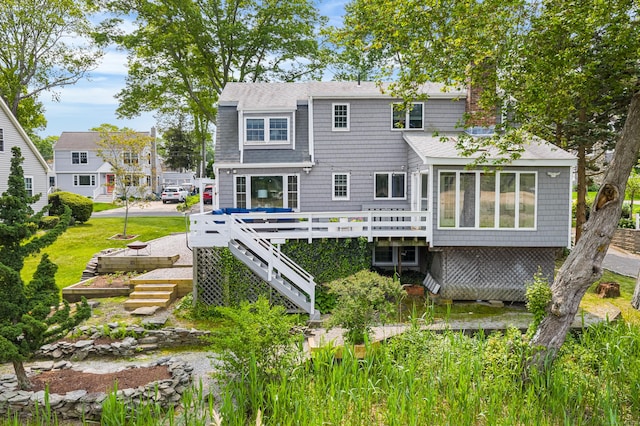 55 Cypress Rd, Old Saybrook, CT 06475 - rear view of house with a deck, roof with shingles, stairway, and a chimney