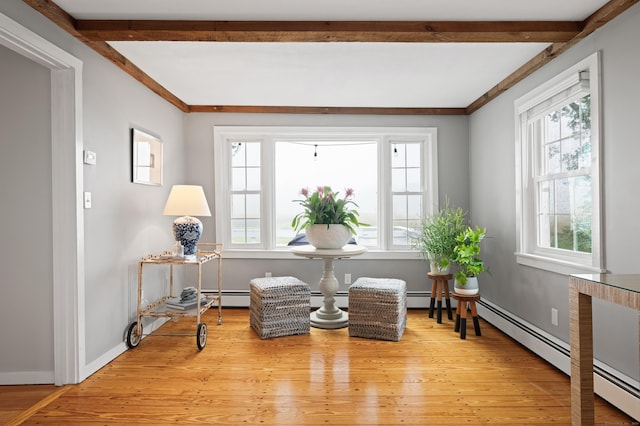 55 Cypress Rd, Old Saybrook, CT 06475 - sitting room featuring beam ceiling, a baseboard heating unit, wood finished floors, and crown molding