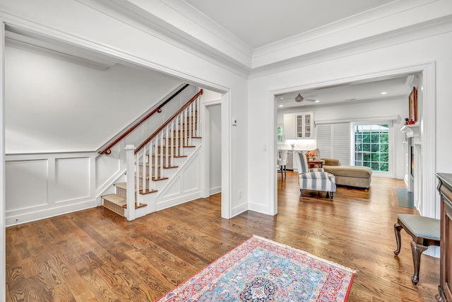 2180 Kings Hwy Unit 1, Fairfield, CT 06824 - entryway featuring stairs, wood finished floors, a decorative wall, ornamental molding, and ceiling fan